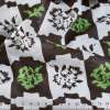 Батист деворе с метанитью коричнево-белая клетка,зеленые цветы ш.140