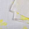 Рогожка костюмна бавовняна біла в яскраві жовті квіти ш.148