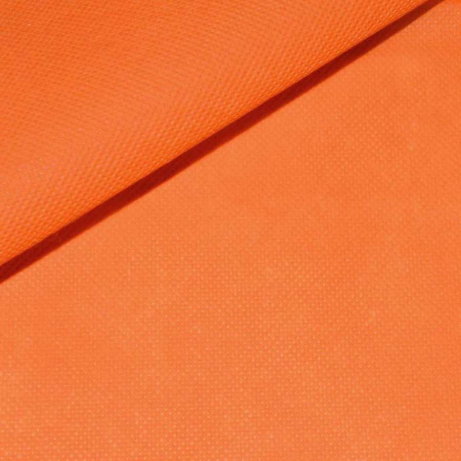Флізелін неклейовий (спанбонд) оранжевий, щільність 70, ш.160