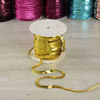 Тасьма-луска на нитці в один ряд 5мм золото яскраве